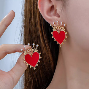 Red heart crown stud earrings with gold trim and white accents.