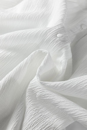 White crinkled texture shirt with button detail