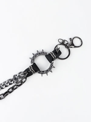 Black spiked chain harness belt with aluminum hardware and clasp.