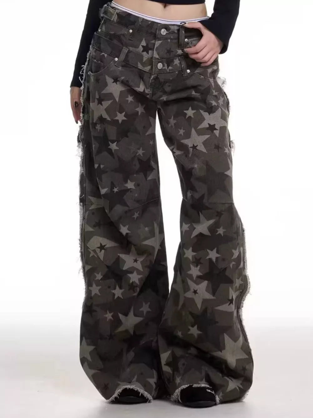 Star-embellished distressed wide-leg jeans in dark grey cotton with raw hems.