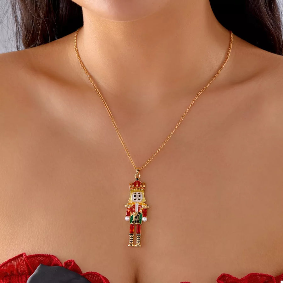 red necklace featuring pendant and figurative