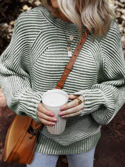 Relaxed ribbed knit boat neck sweater in stripe with a comfortable fit.