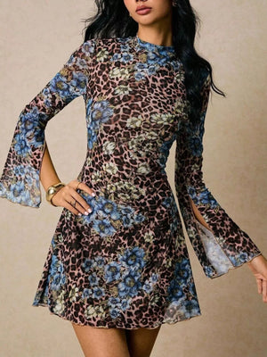 Leopard print floral mini dress with mock neck and slit flare sleeves.