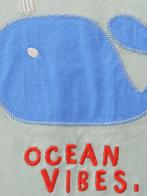 Toddler boys' cotton tee with blue whale embroidery and "OCEAN VIBES" text.