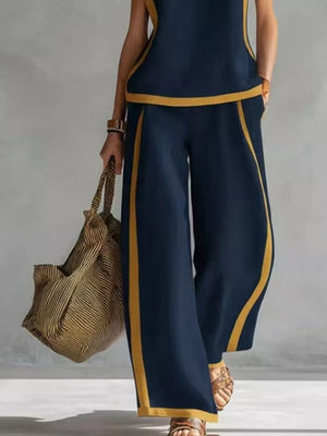 Navy blue sleeveless tank and wide-leg pants set with yellow trim.