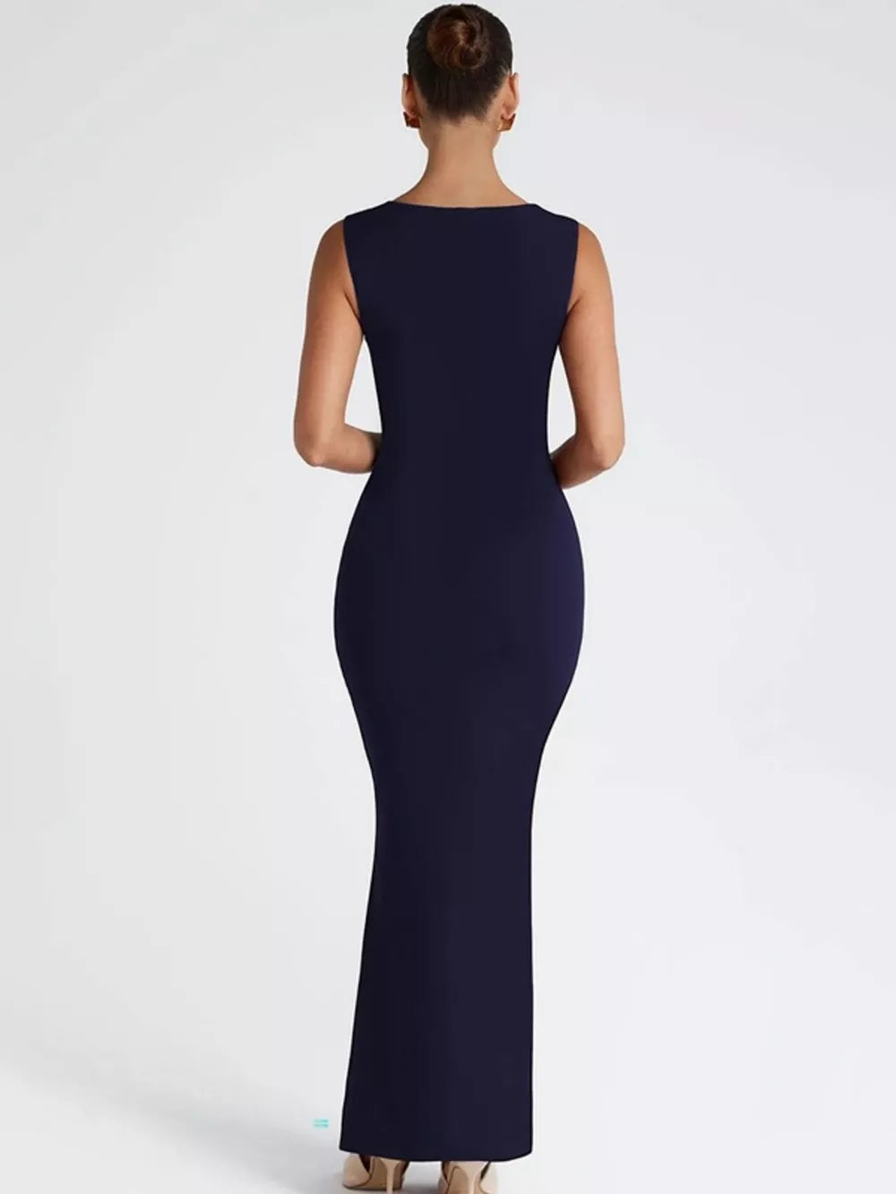 Navy blue bodycon maxi dress with square neck and sleeveless design.