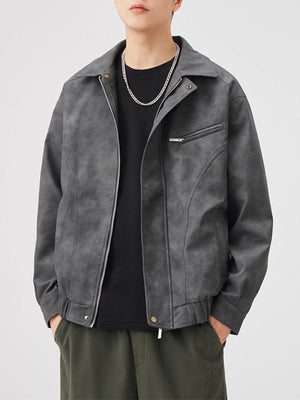 Men's dark gray zip-up leather jacket with a chest pocket detail.