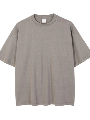 Oversized washed cotton t-shirt in gray with crew neck and short sleeves.