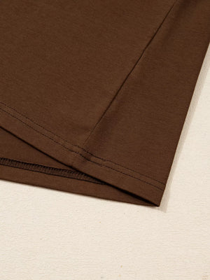 Dark brown cotton blend long-sleeve t-shirt with crew neck and visible stitching details.