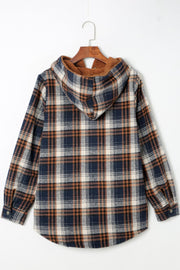 Sherpa-lined plaid overshirt jacket in navy, tan, and cream with a hood.