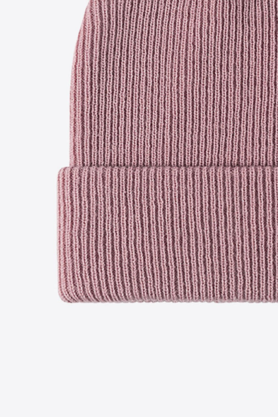 Pink ribbed knit beanie with a cuffed brim
