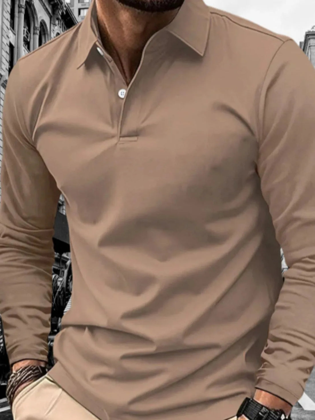 Taupe long sleeve polo shirt with a button placket and collar.