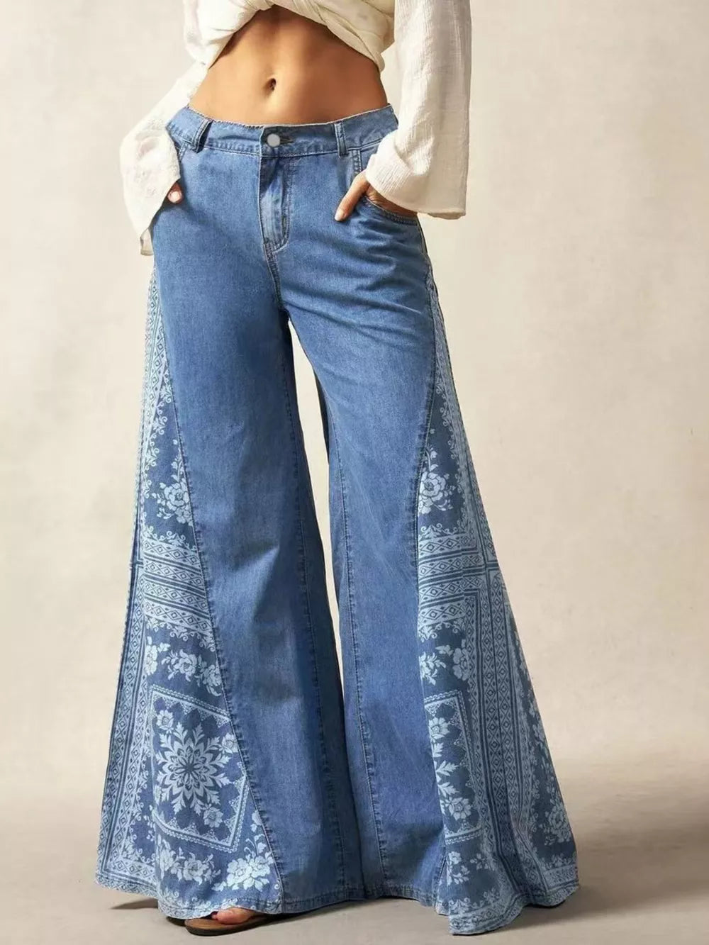 light blue flare jeans with floral and N/A