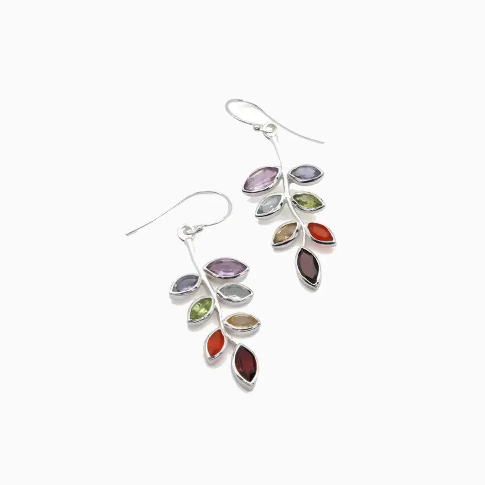 Gemstone leaf drop earrings in multicolor feature marquise-shaped stones on a silver branch design.