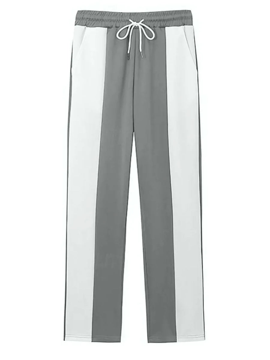 Panelled track pants in gray and white with drawstring waist.