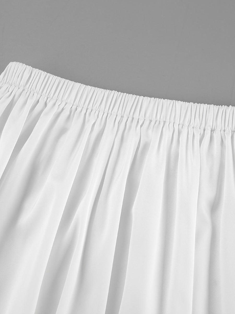 White flowy maxi skirt with elastic waistband and pockets