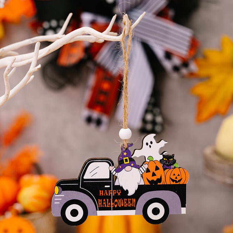 Halloween gnome truck ornament with ghost, pumpkins, and black cat.