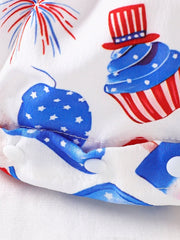 Baby one-piece with patriotic print, cupcakes, fireworks, and white snaps.