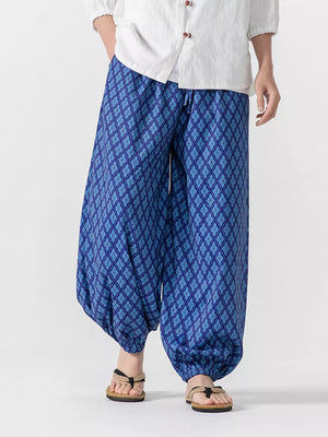 Blue harem joggers with a distinctive diamond pattern and drawstring waist.