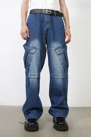 Medium wash denim cargo flare trousers with multiple pockets and a faded wash.