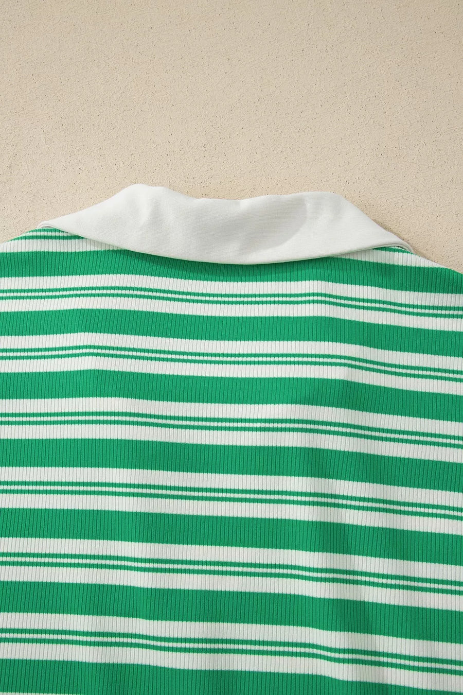 Green and white striped midi dress with collared V-neck and pockets