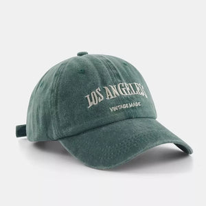 Green baseball cap with embroidered Los Angeles Vintage Made text