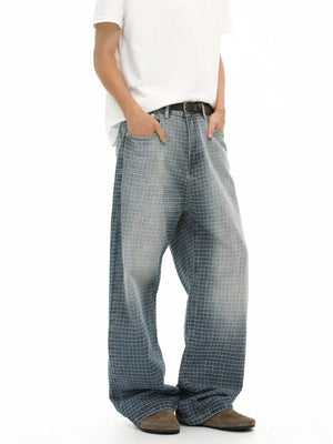 Relaxed-fit men's jeans in blue plaid pattern, cotton denim, with buttoned closure.