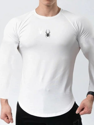 White performance long sleeve top with spider logo detail