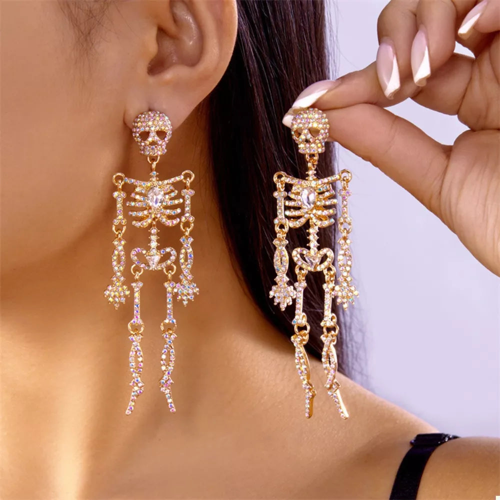 gold earrings with skeleton and not applicable