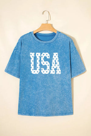 Blue acid wash cotton t-shirt with white star USA graphic and crew neck.