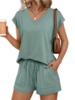 Light green V-neck top and drawstring shorts set with pockets.