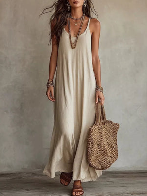 maxi dress in light beige featuring spaghetti strap and loose fit