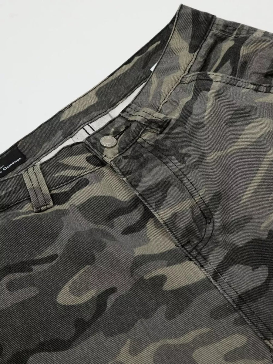 Camouflage cargo capris in cotton with utility pockets and button fly.