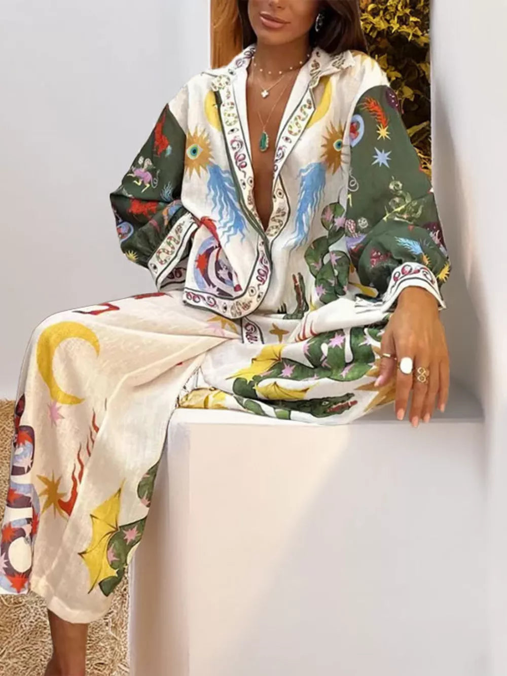 dark green pajama set featuring pocketed and illustrative print