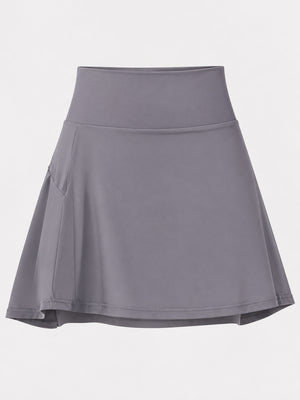 88% nylon, 12% spandex pleated skirt in Light Pink - New with flared silhouette