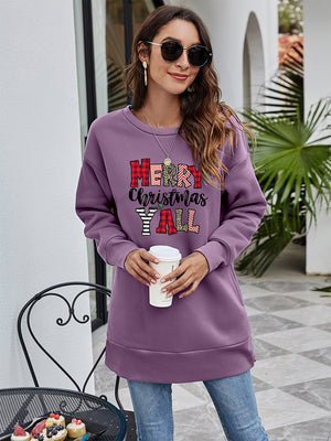 Oversized purple sweatshirt with Merry Christmas Y'all graphic in plaid and animal print.