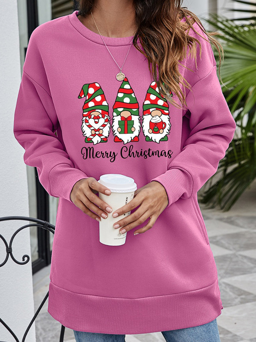 Pink tunic sweatshirt with Christmas gnomes and Merry Christmas graphic.