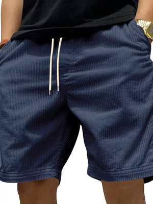 Navy blue corduroy drawstring men's shorts with adjustable waist.