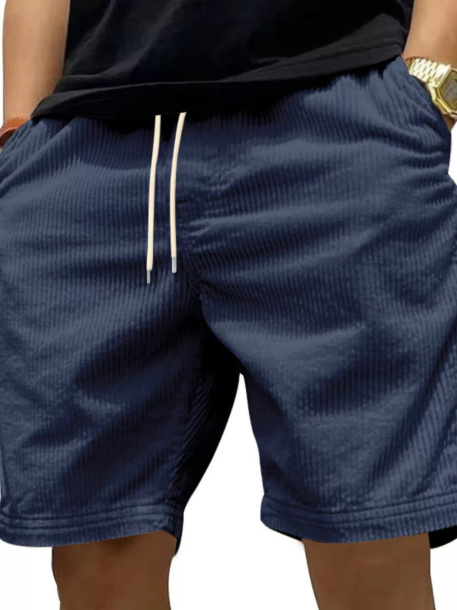 Navy blue corduroy drawstring men's shorts with adjustable waist.