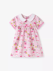 Pink cotton toddler dress with bunny and floral print, Peter Pan collar.