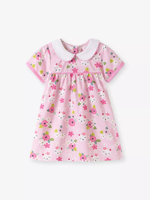 Pink cotton toddler dress with bunny and floral print, Peter Pan collar.