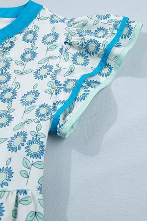 Floral dress in pastel blue with cap sleeves and blue trim