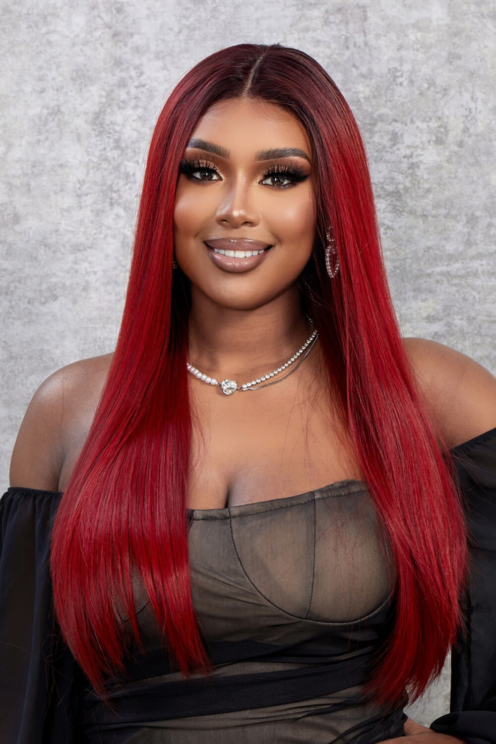 Crimson straight lace front wig with red ombre color, styled with a middle part.