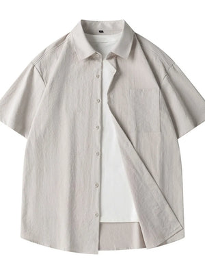 Men's relaxed fit short sleeve button-up shirt in Dust Storm cotton with chest pocket.