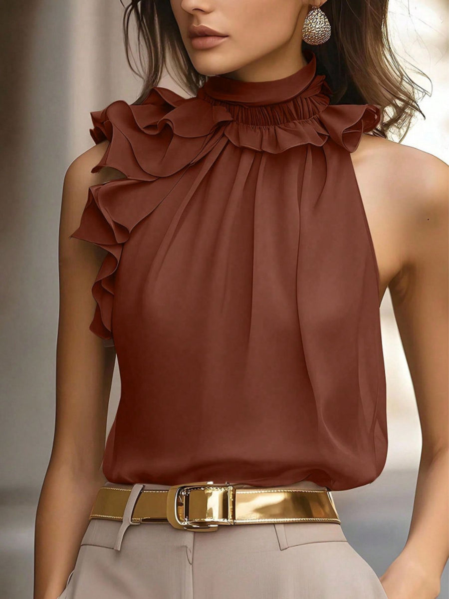 Brown ruffled high neck sleeveless blouse with a gathered neckline.
