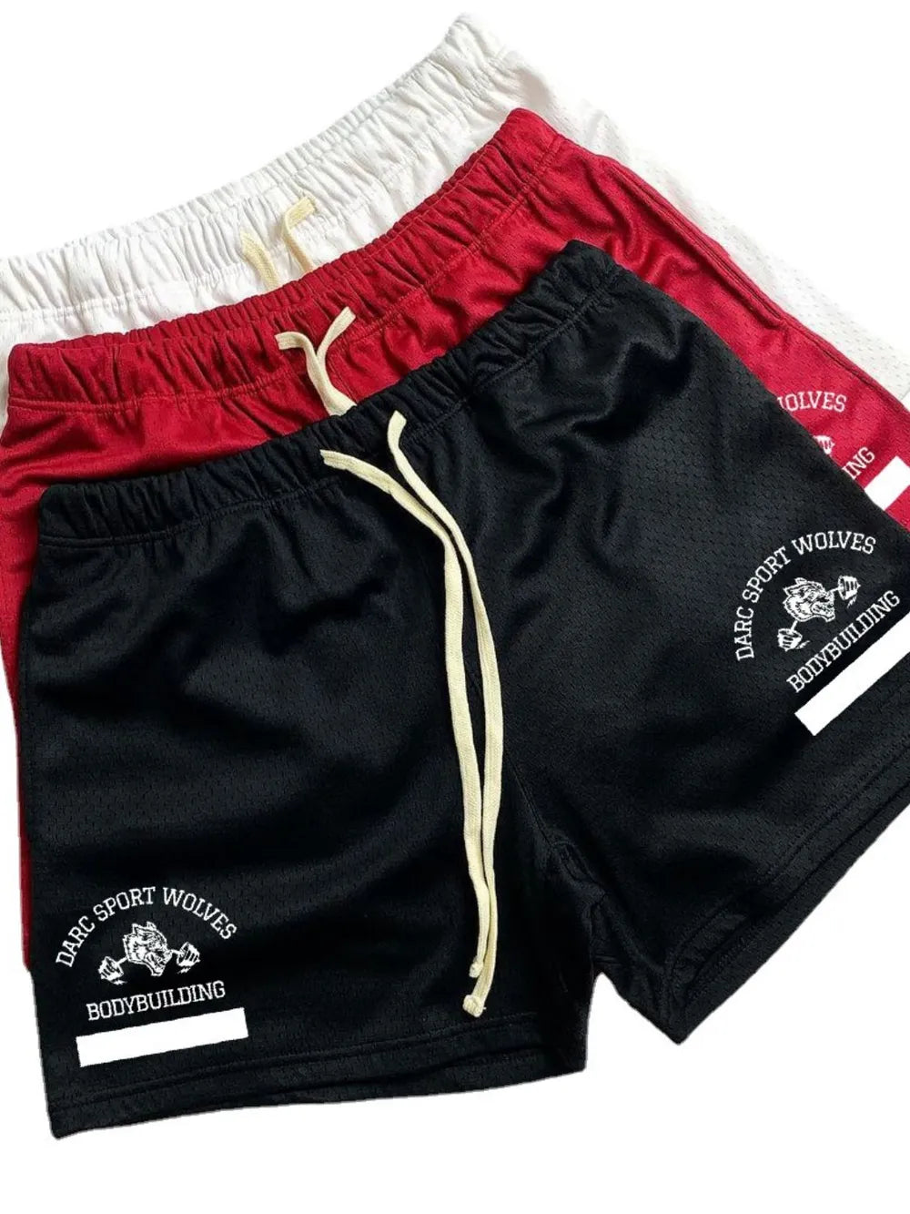 Black mesh sport shorts with drawstring and white logo detail