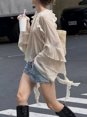 ivory blouse with sheer and bell sleeve