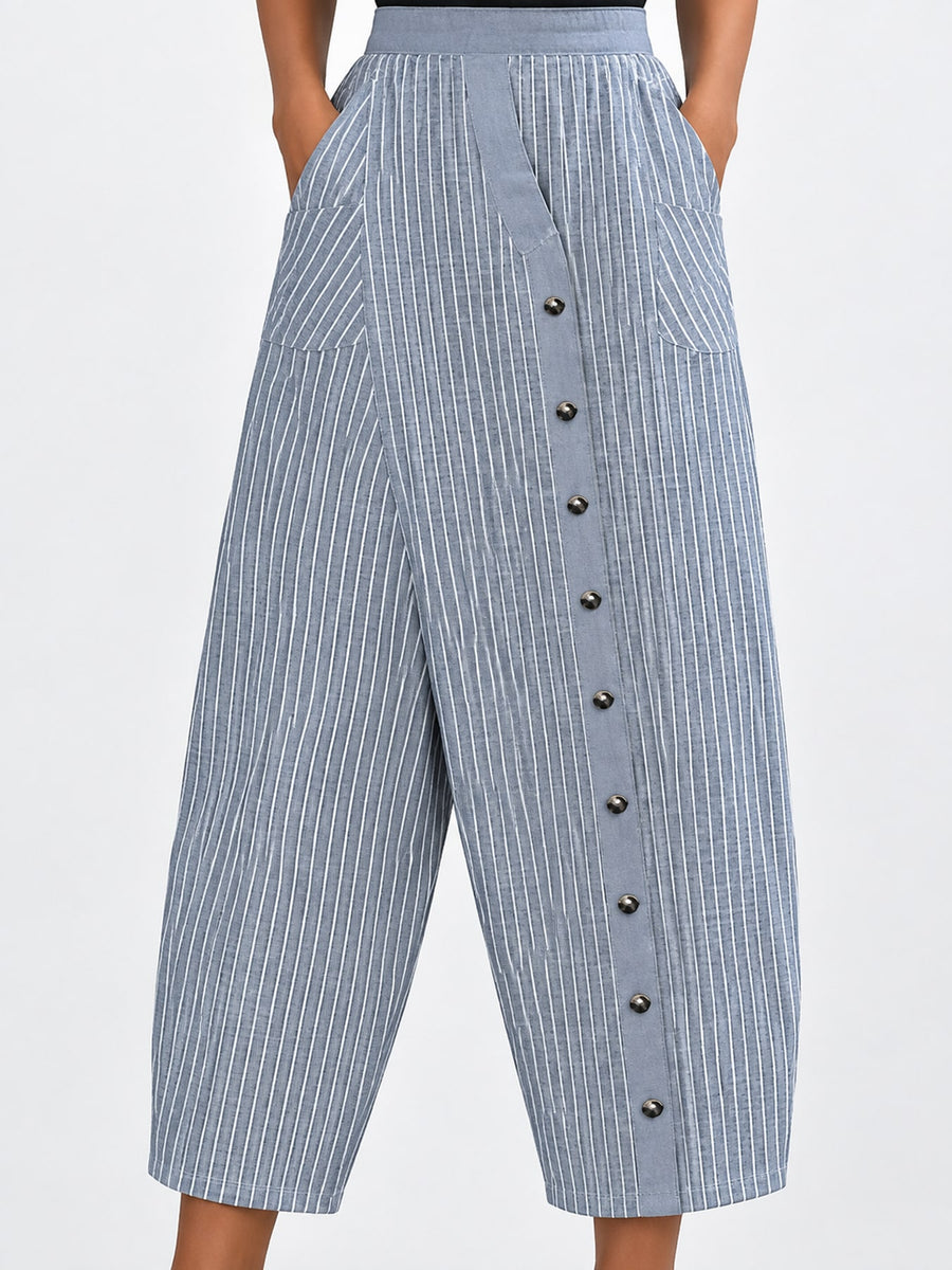 white wide-leg pants featuring decorative button and striped