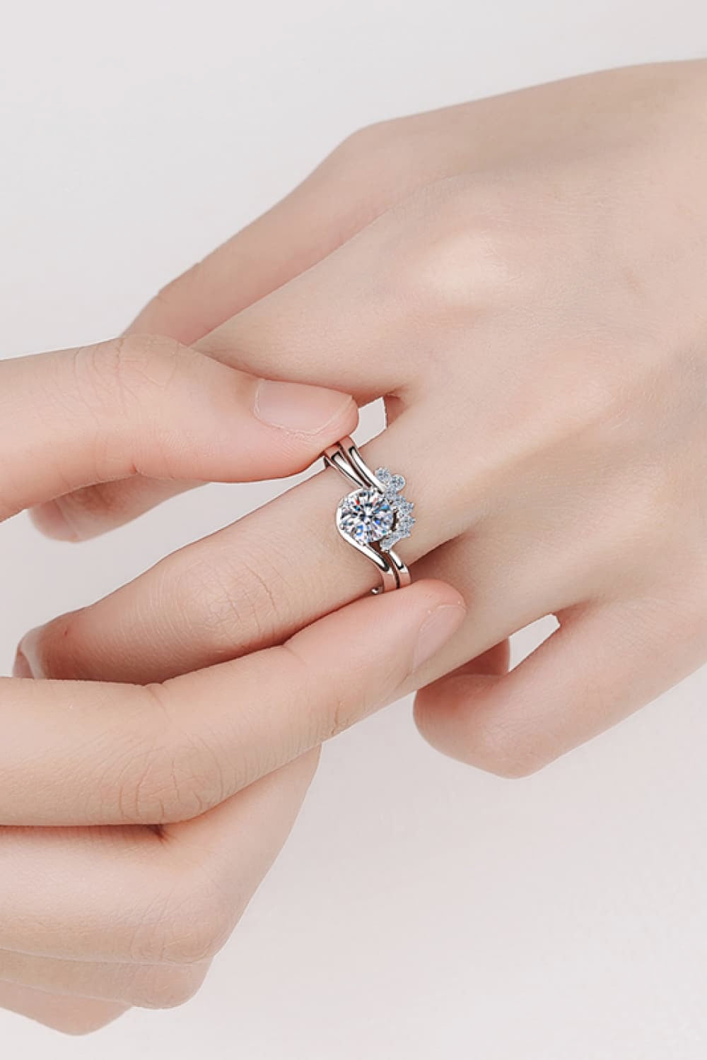 Celestial Moissanite Duo Ring Set in silver with a large center stone and butterfly accents.