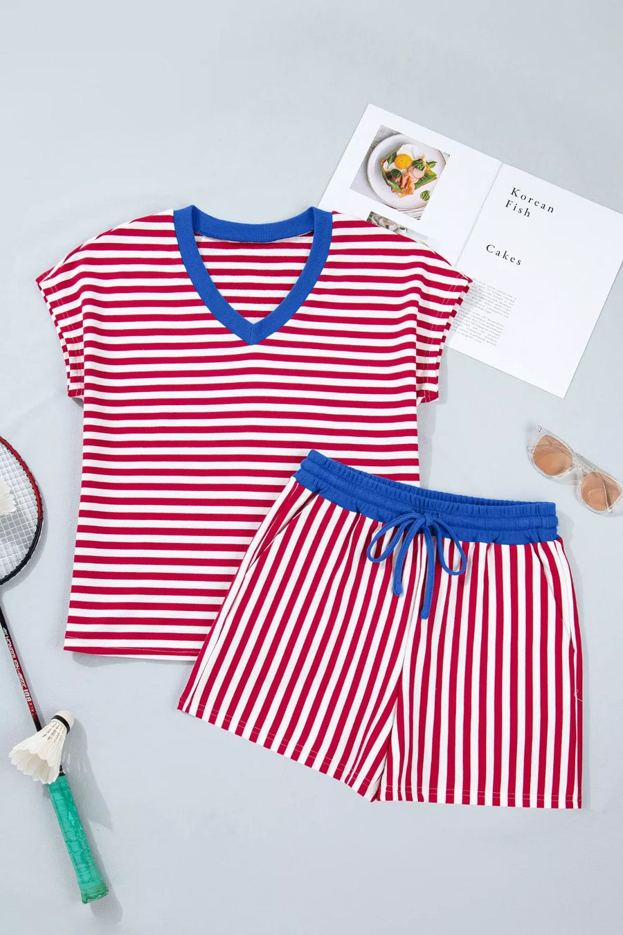 Red and white striped cotton V-neck lounge set with blue trim and drawstring shorts.